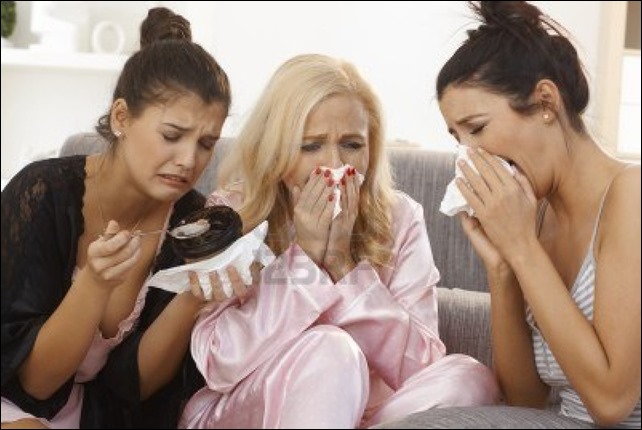 17975210-portrait-of-three-crying-women-at-home-sharing-sorrow-wearing-pyjamas